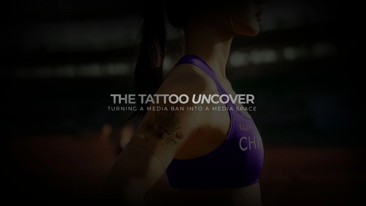 Key visual for The Tattoo Uncover: Wu Yan Ni's shoulder tattoo, half-hidden in shadow, with the line turning a media ban into a media space.